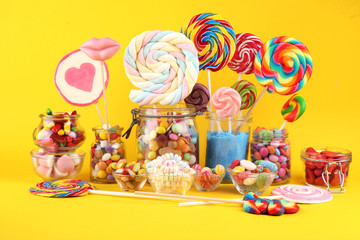 candies with jelly and sugar. colorful array of different childs sweets and treats.