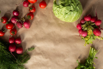 Healthy food background. Assortment of fresh vegetables on paper background