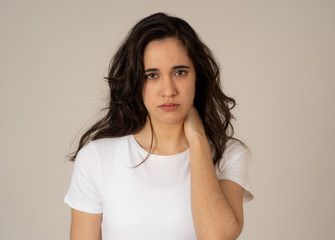 Obraz premium Portrait of sad and depressed woman. Isolated on neutral background. Human expressions and emotions