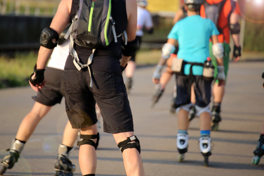 Group of roller blader in the evening sun