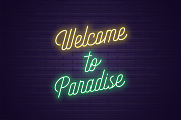 Neon lettering of Welcome to Paradise. Glowing text
