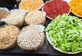 Different dried and candied fruit in a market