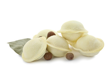 Raw meat dumplings with bay leaf on white background