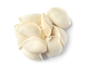 Pile of raw dumplings on white background, top view
