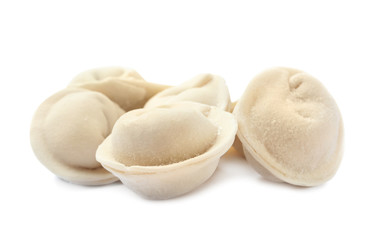 Pile of raw dumplings on white background