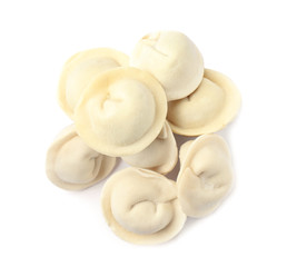 Pile of raw dumplings on white background, top view