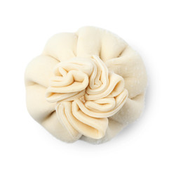 Frozen raw dumpling on white background, top view