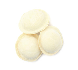 Fototapeta na wymiar Frozen raw dumplings on white background, top view