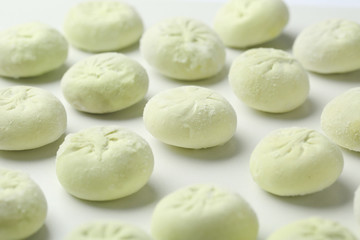 Fototapeta na wymiar Raw dumplings on white background, closeup. Traditional dish