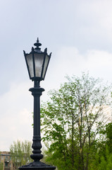 Fototapeta na wymiar Classic style city lamppost at sunset, close up