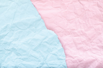 Background of a piece of pink and blue crumpled paper