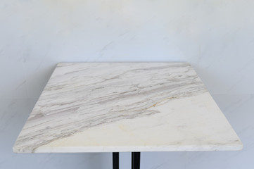 Marble table adjoining on marble wall