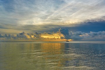 Obraz premium Sunset on the Caribbean Sea. City of Cancun, Mexico.