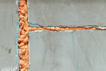 Polyurethane foam insulation in wall - obrazy, fototapety, plakaty
