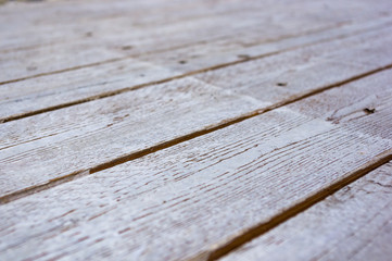 texture of the painted shabby wooden flooring made of boards, grunge background