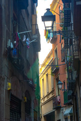 ES, Barcelona 14.04.2019: Narrow street in the old city of Barcelona