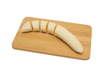 Sliced bananas on a wooden board, serial cutting object