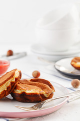 breakfast. Pancakes with peanut and strawberry jam. closeup.