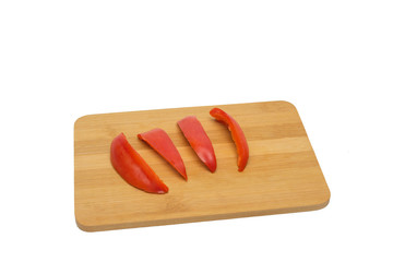 Sliced Bulgarian Peppers on a Wooden Board