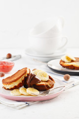 breakfast. Pancakes with peanut butter and bananas.