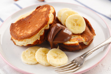 breakfast. Pancakes with peanut butter and bananas.