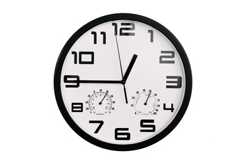 simple classic black and white round wall clock isolated on white. Clock with arabic numerals on wall shows 12:45 , 00:45