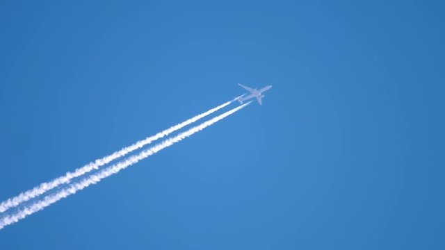 Airplane flying high in the sky
