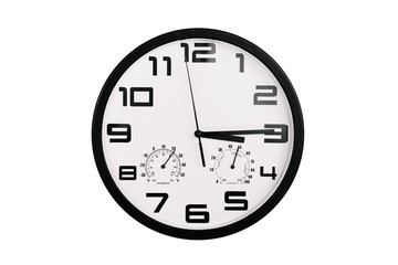 simple classic black and white round wall clock isolated on white. Clock with arabic numerals on wall shows 15:15 , 3:15