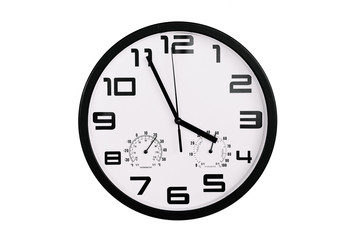 simple classic black and white round wall clock isolated on white. Clock with arabic numerals on wall shows 15:55 , 3:55