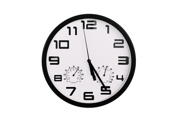 simple classic black and white round wall clock isolated on white. Clock with arabic numerals on wall shows 17:25 , 5:25