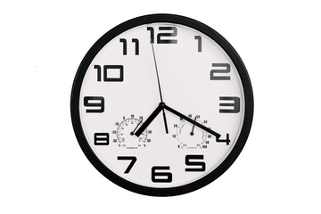 simple classic black and white round wall clock isolated on white. Clock with arabic numerals on wall shows 19:20 , 7:20