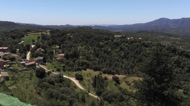 Aerial view by Drone in Granera, village with castle of Barcelona. Spain. 4k Video