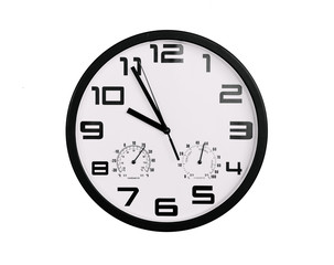 simple classic black and white round wall clock isolated on white. Clock with arabic numerals on wall shows 9:55 , 21:55