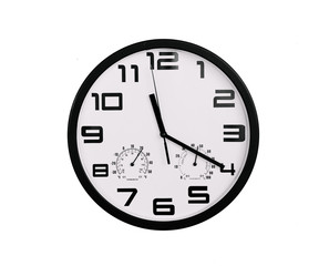simple classic black and white round wall clock isolated on white. Clock with arabic numerals on wall shows 11:20 , 23:20