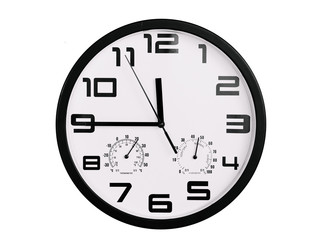 simple classic black and white round wall clock isolated on white. Clock with arabic numerals on wall shows 11:45 , 23:45