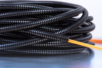 Cable with black flexible corrugated tube