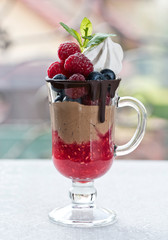 Dessert withl with berries on a retro background on on spring background