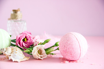 Floral natural organic cosmetics on pink background