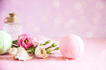 Obraz na płótnie Canvas Floral natural organic cosmetics on pink background