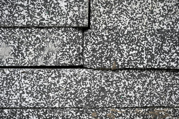 Stacked insulator material in form of rectangular plates.