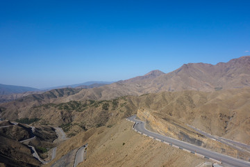 Road with lots of curves and serpentines in the Atlas Mountains between Marrakesh and Ouarzazate, Morocco