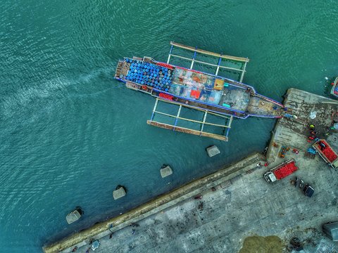 aerial photography of boat near dock