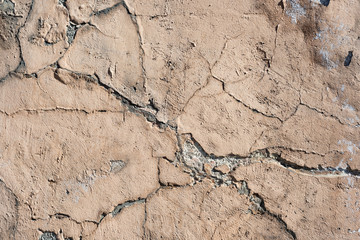 Broken grunge wall in the cracks