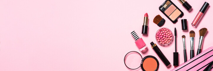 Makeup professional cosmetics on pink background. - obrazy, fototapety, plakaty