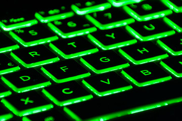 Close-up of a backlit gaming keyboard.