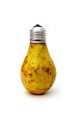 Light bulb made from green pear isloated on white background.