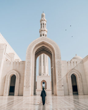 person standing in the middle of mosque