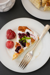 Pieces of pie with cheese with fruits. Hoemmade cottage cheese pie, pastry or bakery concept.