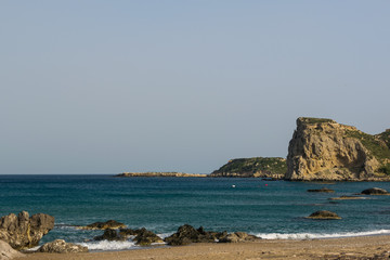 Fototapeta na wymiar beautiful stony coast of mediterranean sea in greece
