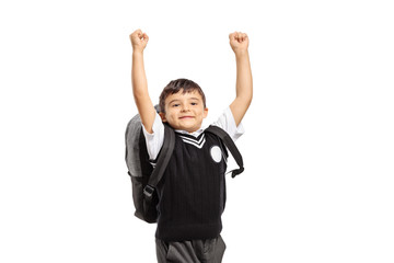 Happy schoolboy jumping